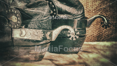 Abstract Grungy Western Backgrounds With Cowboy Boots Stock Photo