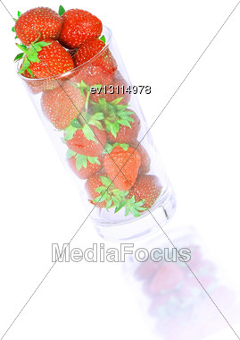 Glass With Fresh Strawberries And Soda On White Background. Isolated Stock Photo