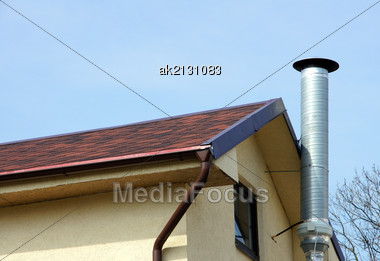 Pipe Is Located On A Wall Of A Building Stock Photo