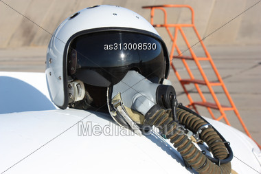 Protective Helmet Of The Pilot Against The Plane With An Oxygen Mask On A Fuel Tank Stock Photo