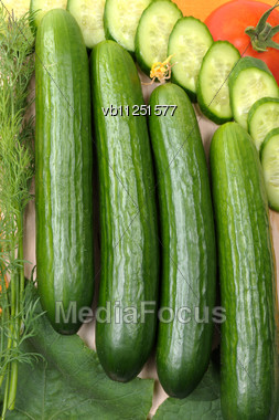 Smooth Cucumbers And The Cut Circles Stock Photo