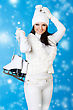 Playful Stock Photo: Beautiful Woman In Winter White Clothes With Skates.
