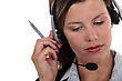 Stock Photo : Business Stock Photography: Brunette Call-center Worker Listening To Customer