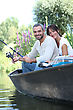 Stock Photo : Magnificent Stock Photo: Couple Fishing In A Boat On A Lake