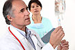 Doctor Hooking Up An IV