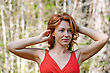 Stock Photo : Woman Stock Image: Portrait Of Red-haired Adult Woman In Nature