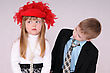 Stock Photo : Waiting Stock Photo: Sad Girl In A Red Hat Waiting For An Apology From The Boy