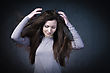 Studio Portrait Of Woman With Long Hair