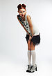 Stunning Asian Redhead Woman Wearing Contemporary Dress. Studio Shot
