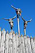 Wooden Masks Against The Blue Sky - stock photo